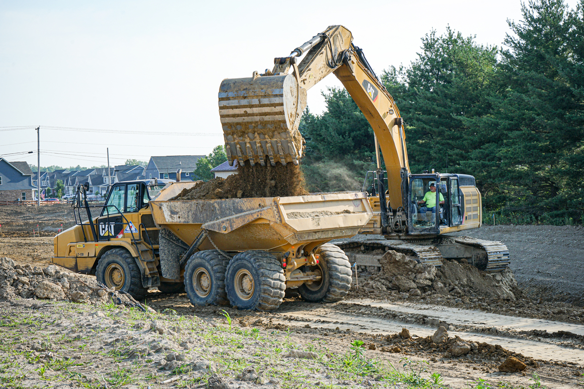 Track Excavator Loading a Dump Truck